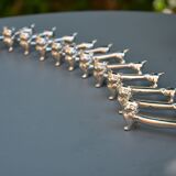 12 silver-plated cat knife rests