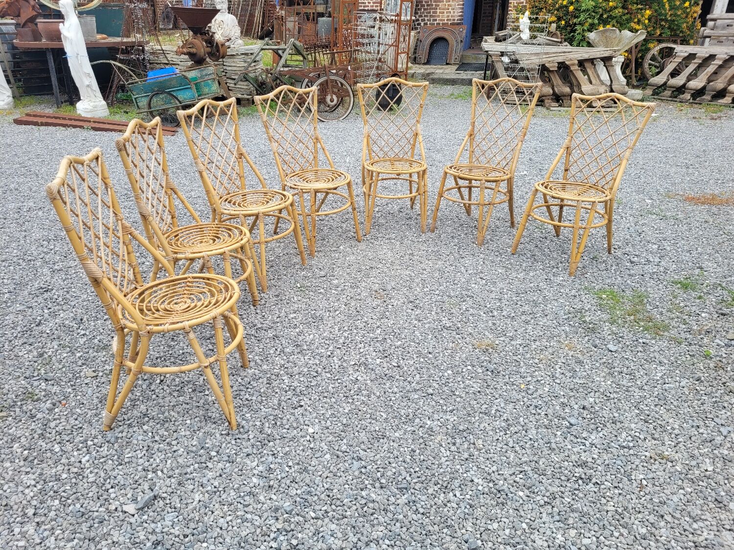 7 vintage rattan chairs