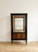 Art Deco display cabinet in wood and black lacquer