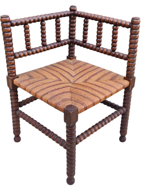 Ancien fauteuil paillé d angle de coin en bois tourné