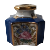 Ink in blue and white earthenware with floral decoration