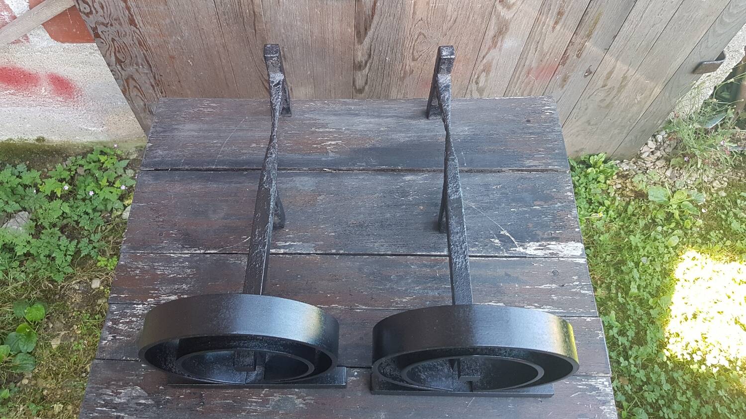 Pair of wrought iron fireplace andirons circular shape vintage