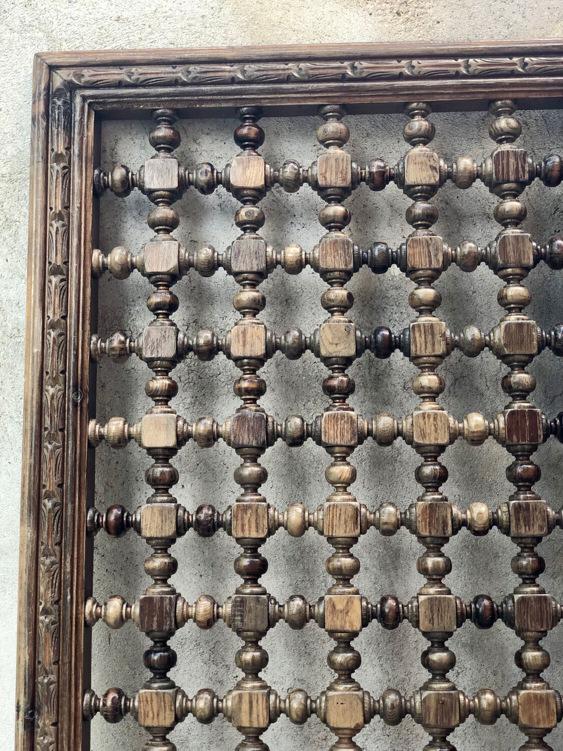 Carved wooden headboard