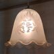 Suspension style Art Nouveau glass globe with screen-printed floral pattern.