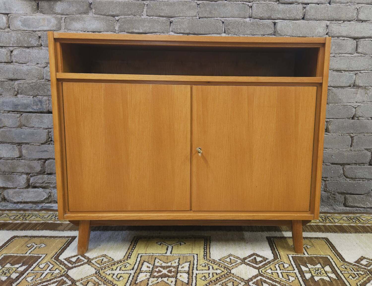 Small Scandinavian sideboard with compass legs, 1970s