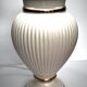 Vintage white ceramic table lamp, ribbed body and conical shade.