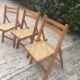 3 wood folding chairs and vintage canning