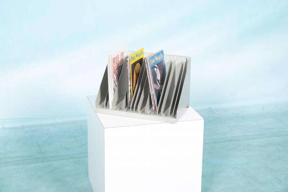 Vintage 1960s metal magazine rack, storage for single LPs.