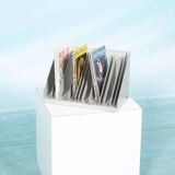 Vintage 1960s metal magazine rack, storage for single LPs.