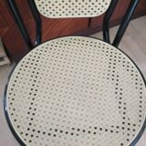 Chair in natural rattan and black metal