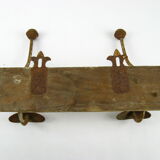 Double patere with "fleur de lys" support