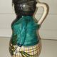 Vintage figurative pitcher in glazed terracotta – Female character