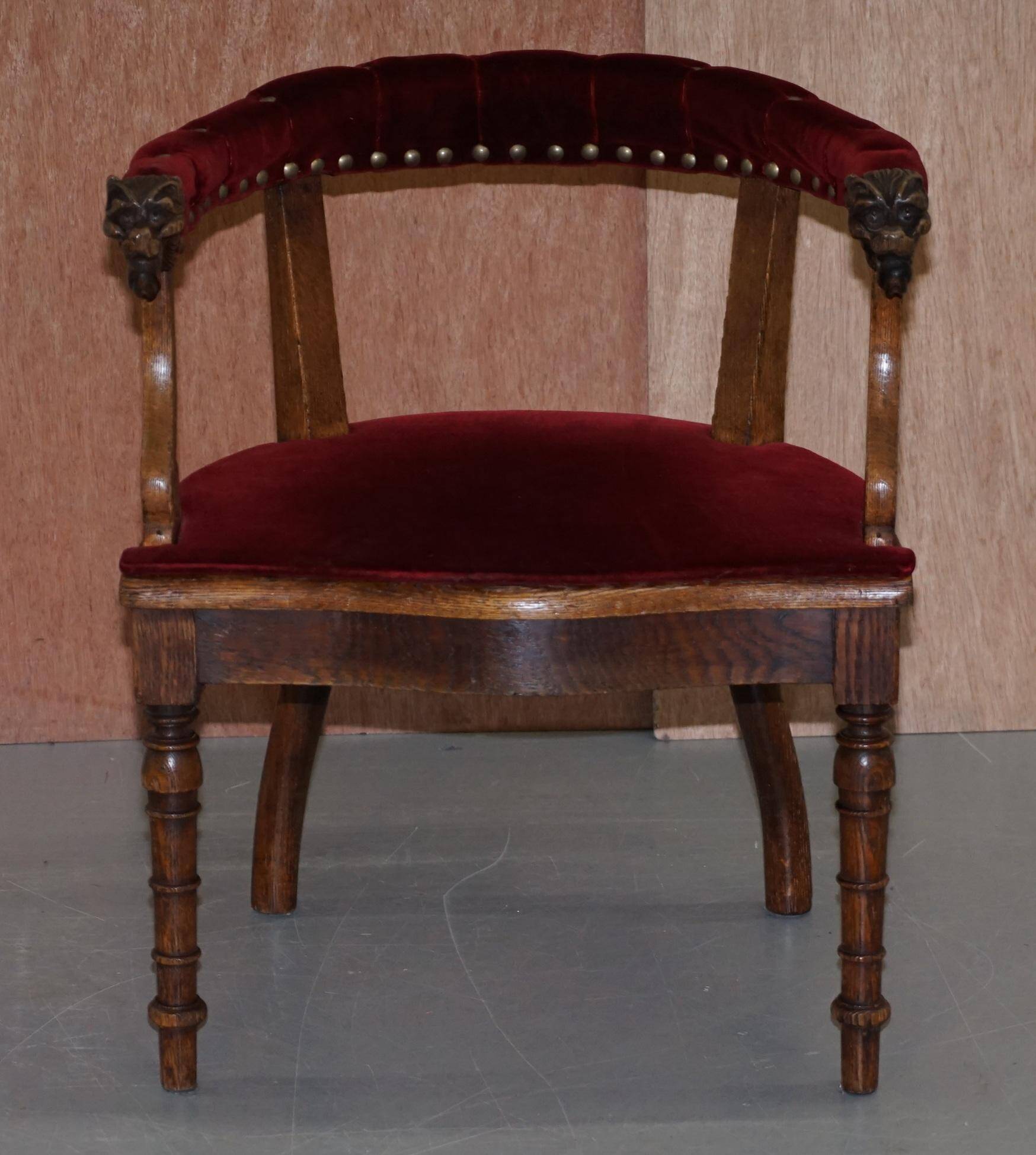 Antique Régence Bergère Armchair in Carved Oak with Lion Head Armrests