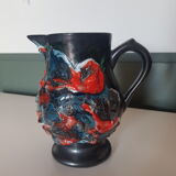 Glazed ceramic pitcher