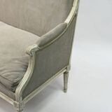 Louis XVI style canapé, in white lacquered wood.