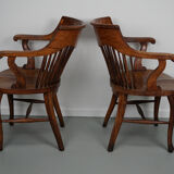 Pair of English Edwardian Oak Spindle Back Captains Office Desk Chairs