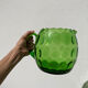 4 green water glasses and vintage blown glass carafe