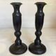 Pair of large black metal candlesticks