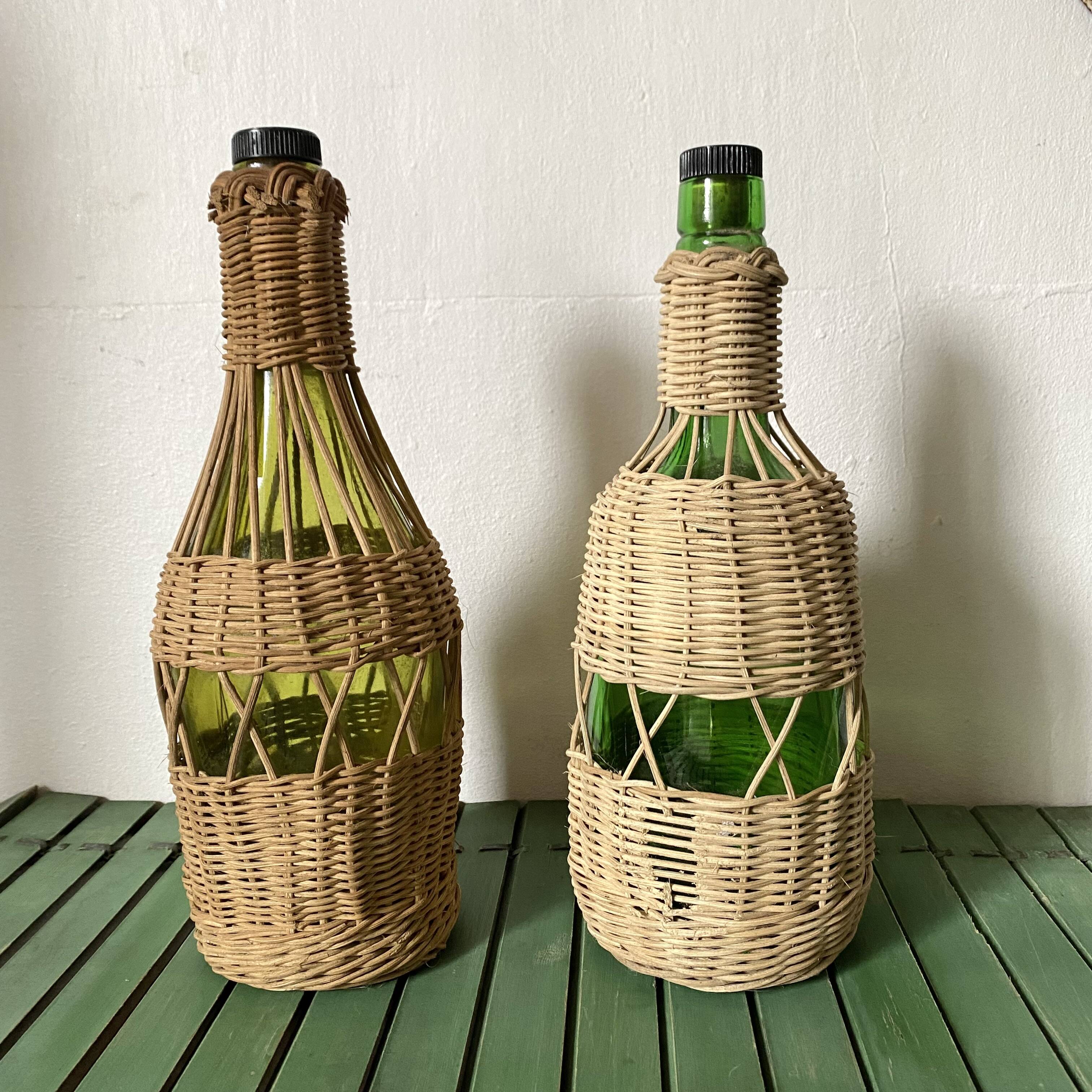 Glass bottles and woven rattan