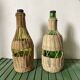 Glass bottles and woven rattan