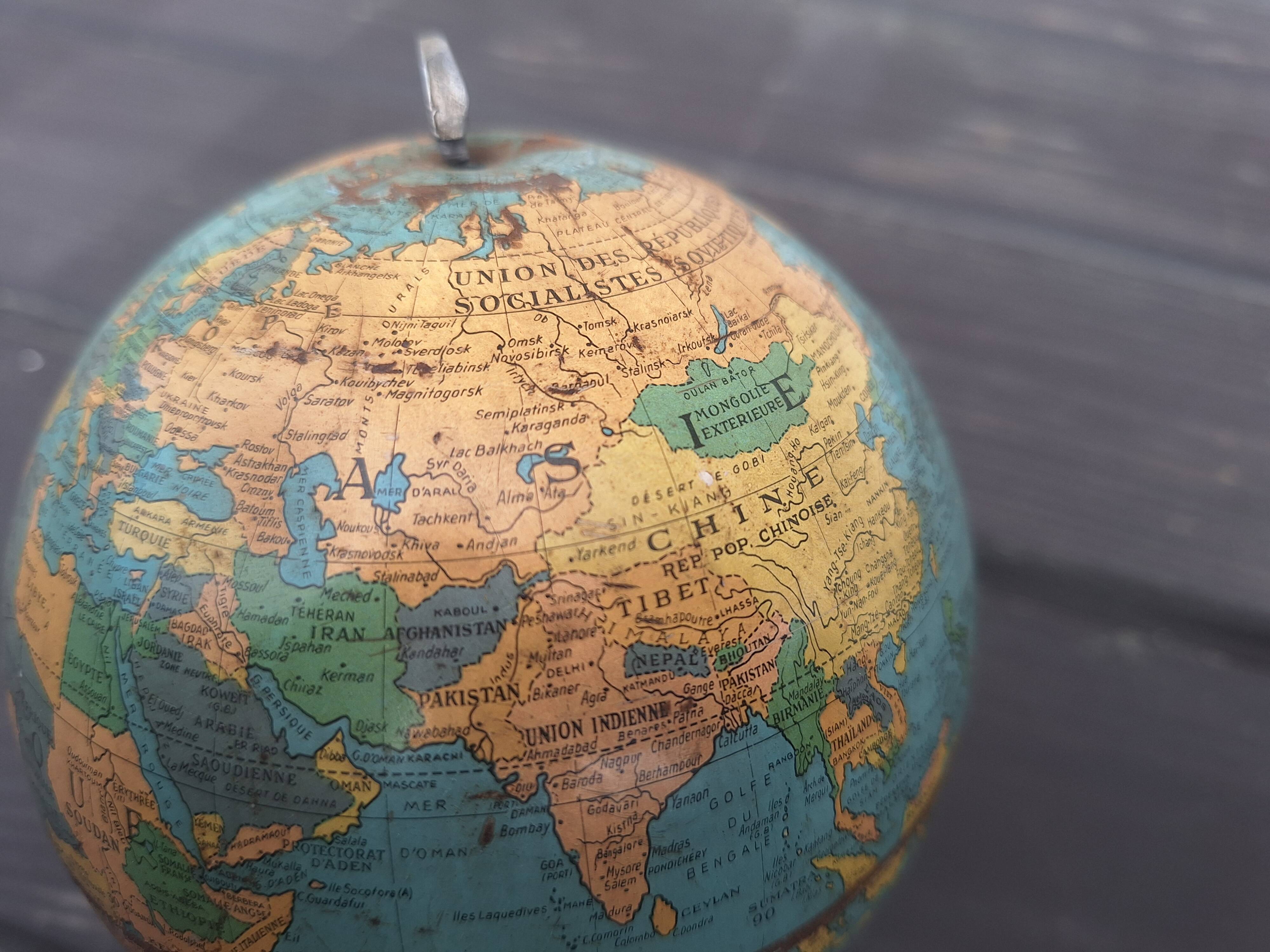 Old small metal globe "taride maps"