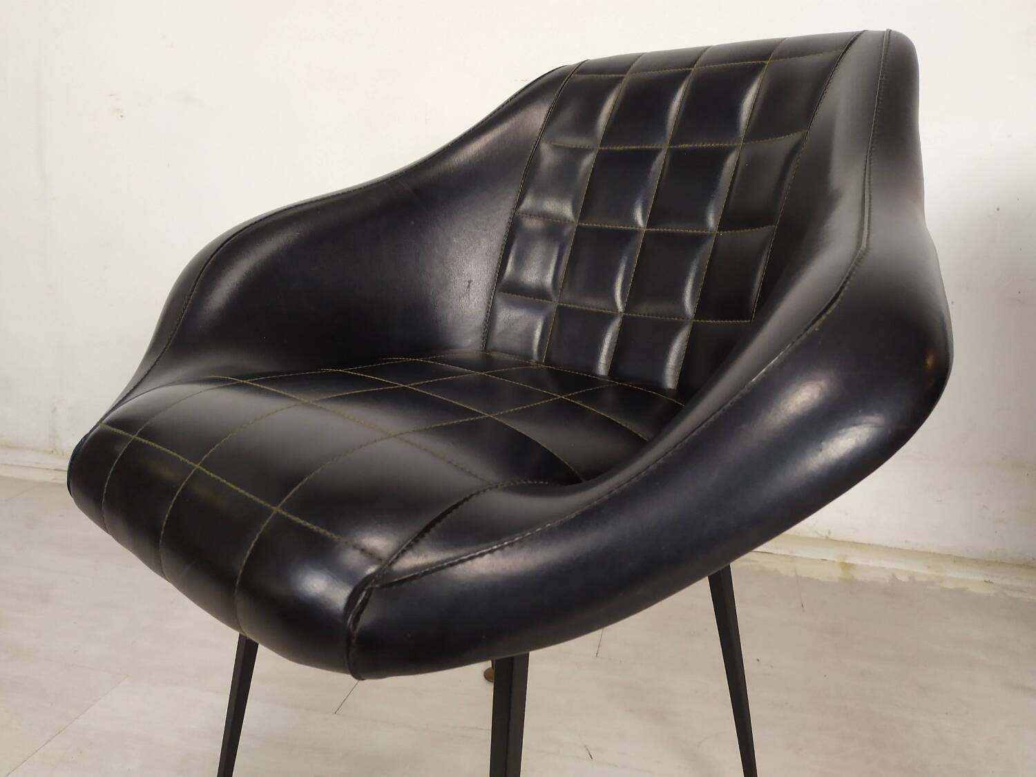 Vintage black skai armchairs