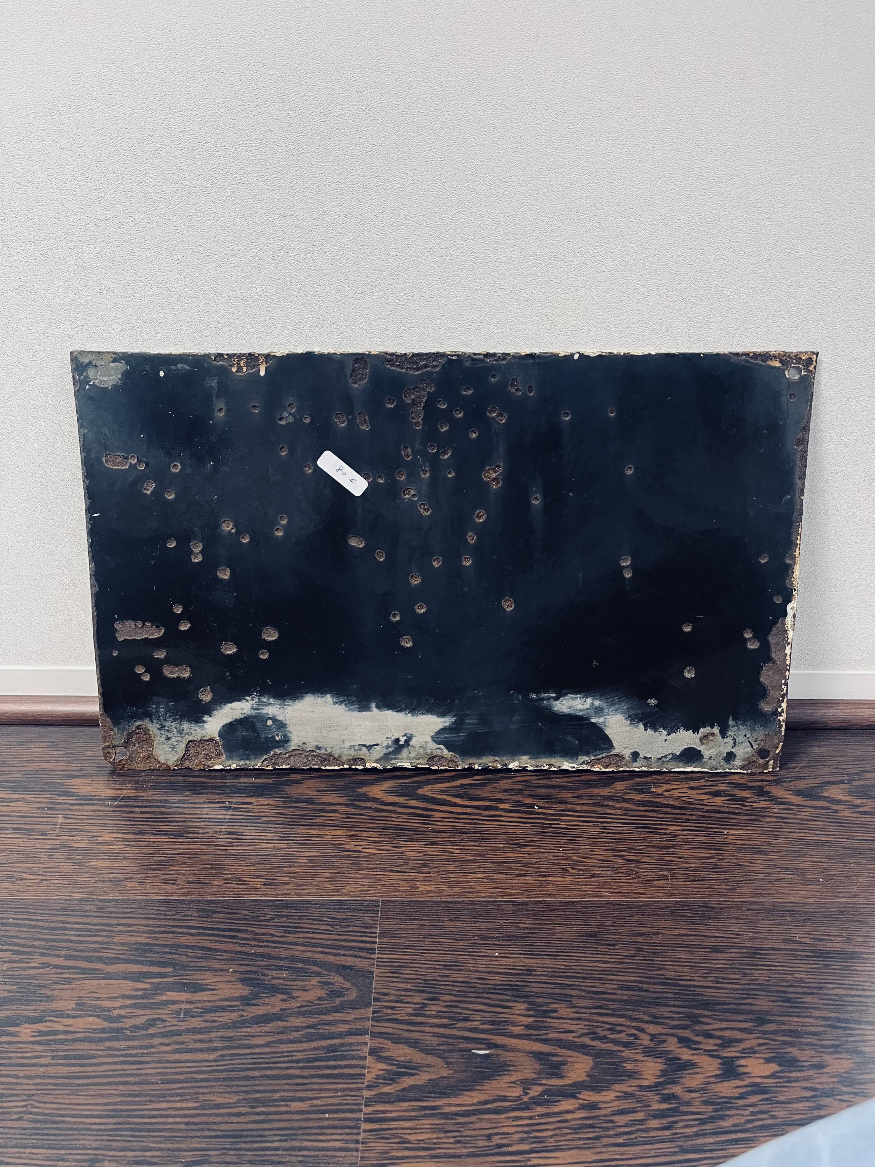 Enamelled street sign "Rue de Valmy"