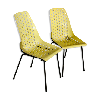 Pair of yellow plastic chairs