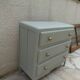 1950s commode enhanced in verdigris.
