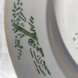 Round dish of Creil and Montereau green color with stamp and hollow mark