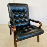 Vintage mid-century Scandinavian black leather lounge chair 1970s