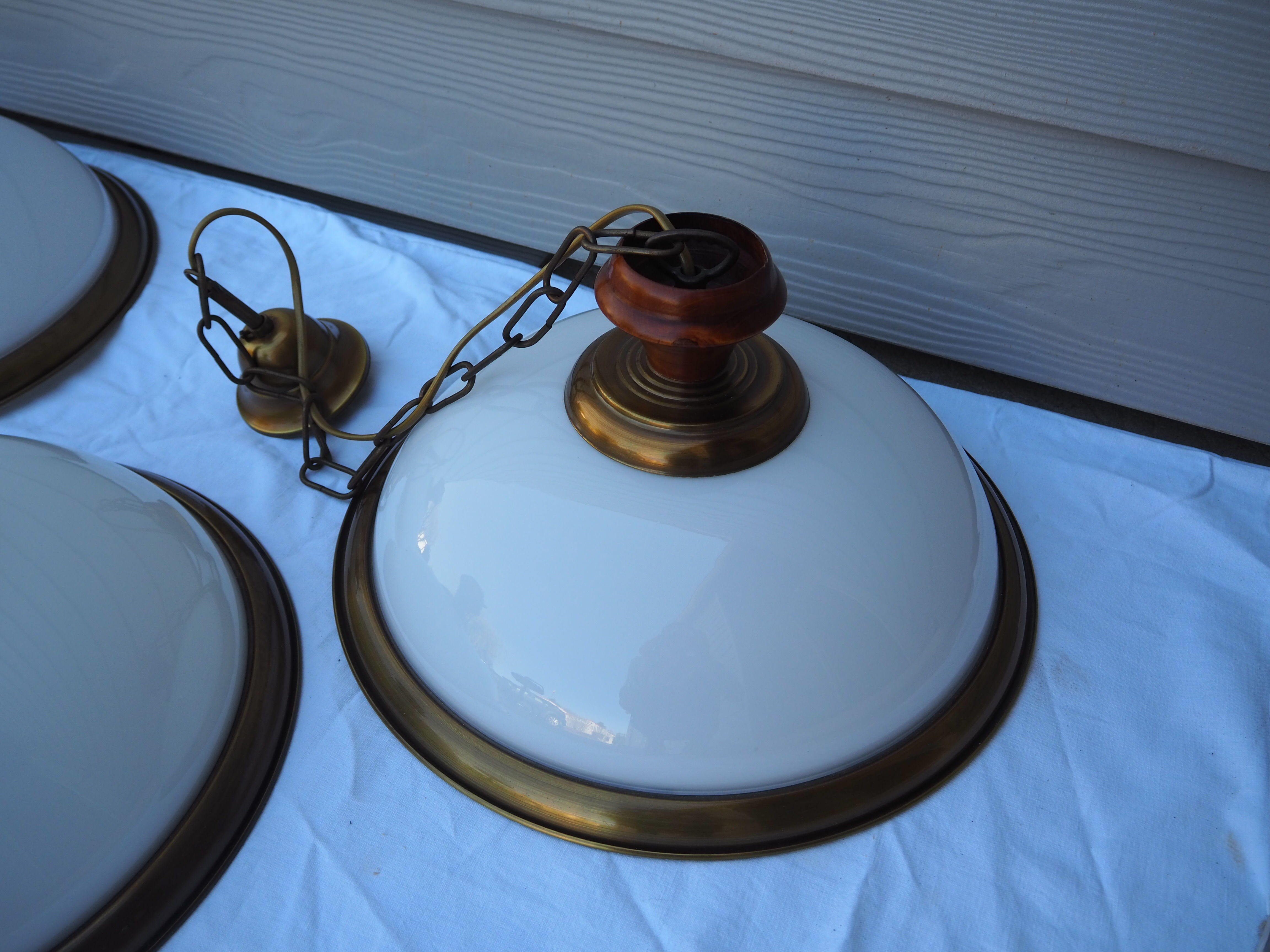Suspension in white opaline, its edge in aged brass