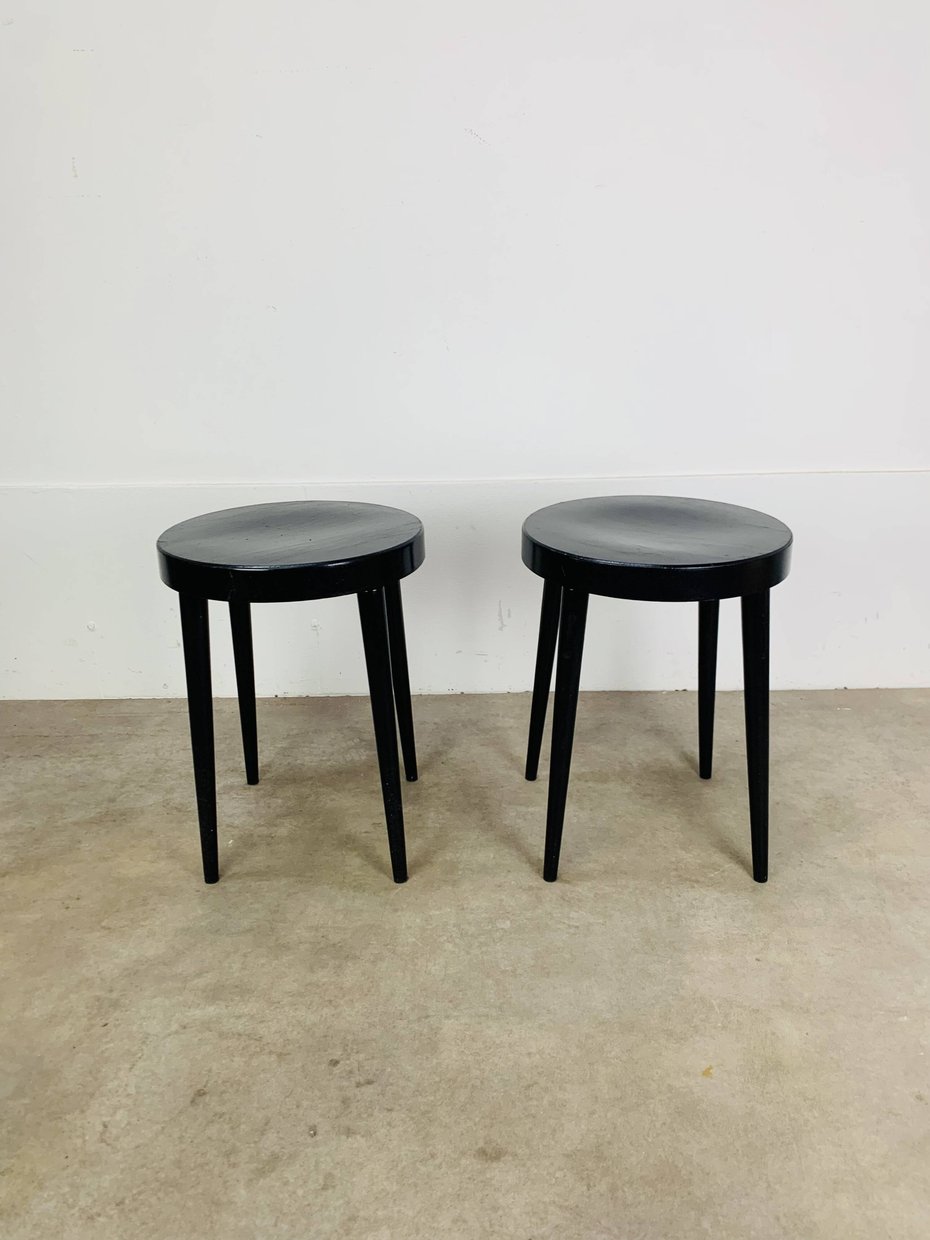 Pair of black Baumann stools, 1960s