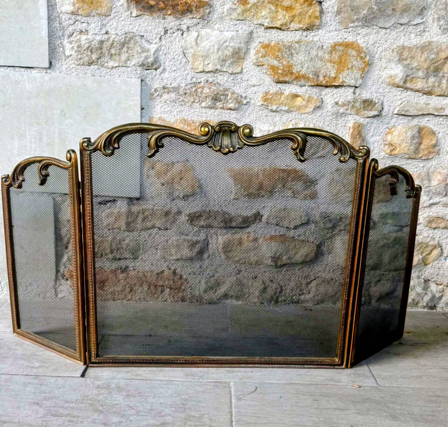 Brass fireplace screen in Louis XV style
