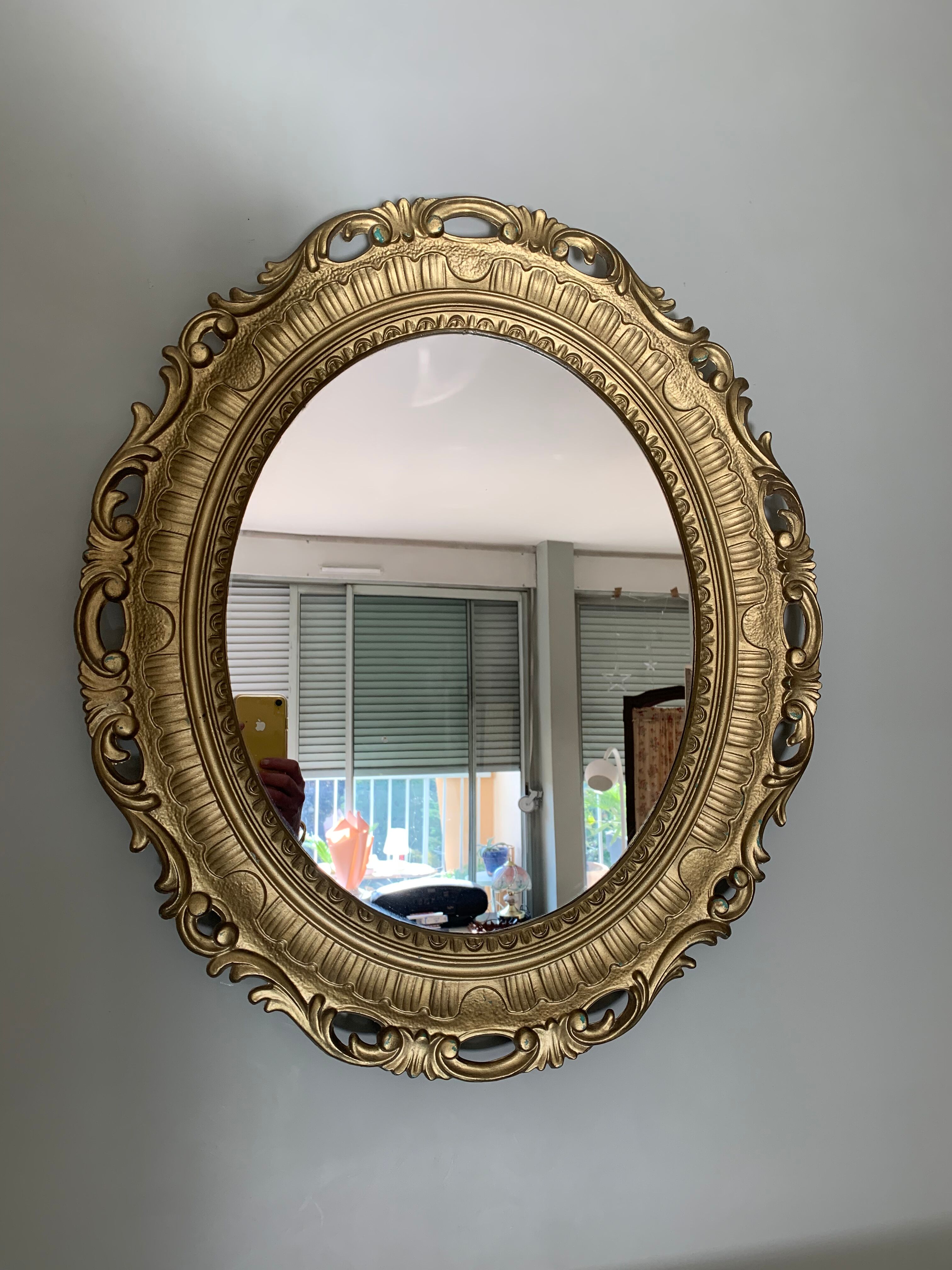Miroir ovale doré années 70