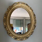 Miroir ovale doré années 70