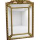 Rectangular glass with a golden frame and a pediment adorned with laurel branches.