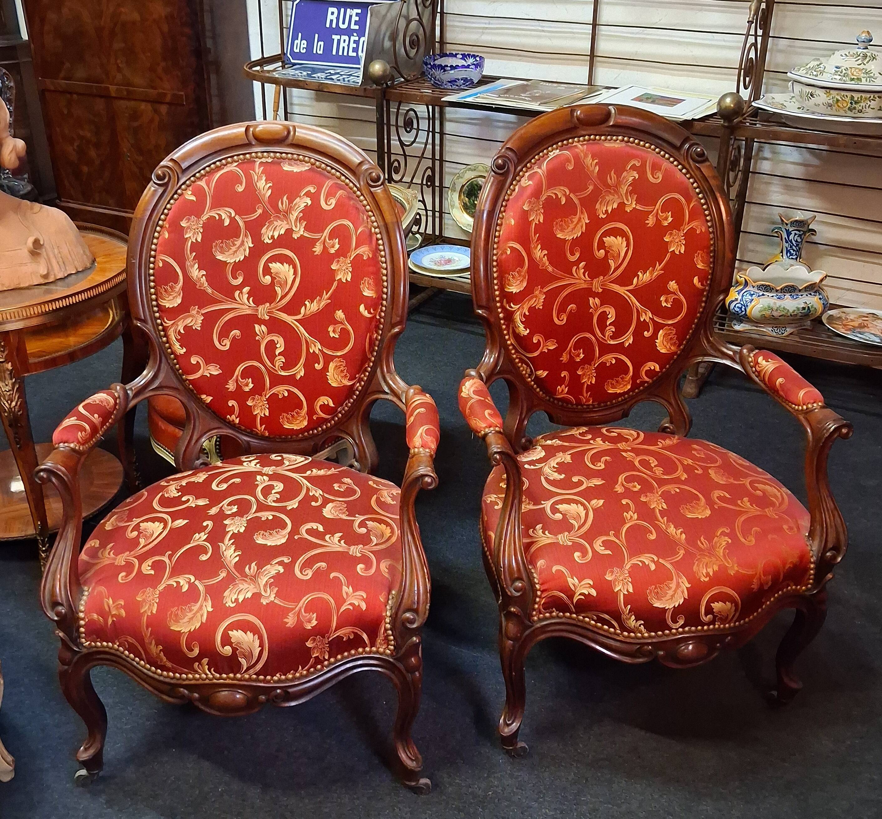 pair of mahogany armchairs, dating from the 19th century