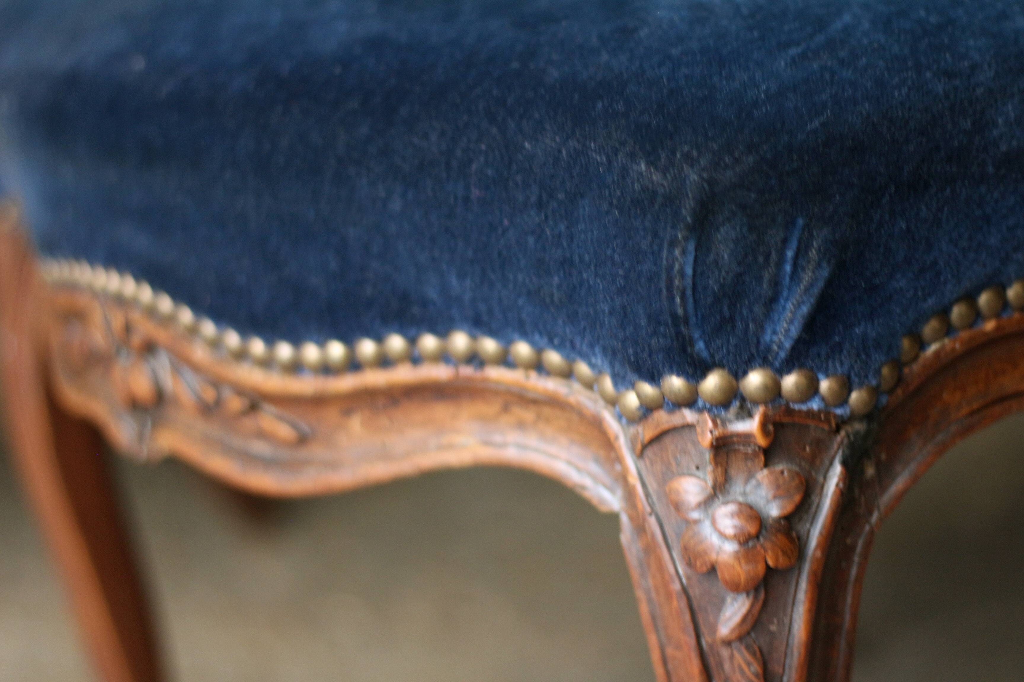 Adorable pair of low chairs from the 19th century. Wood and velvet fabric.