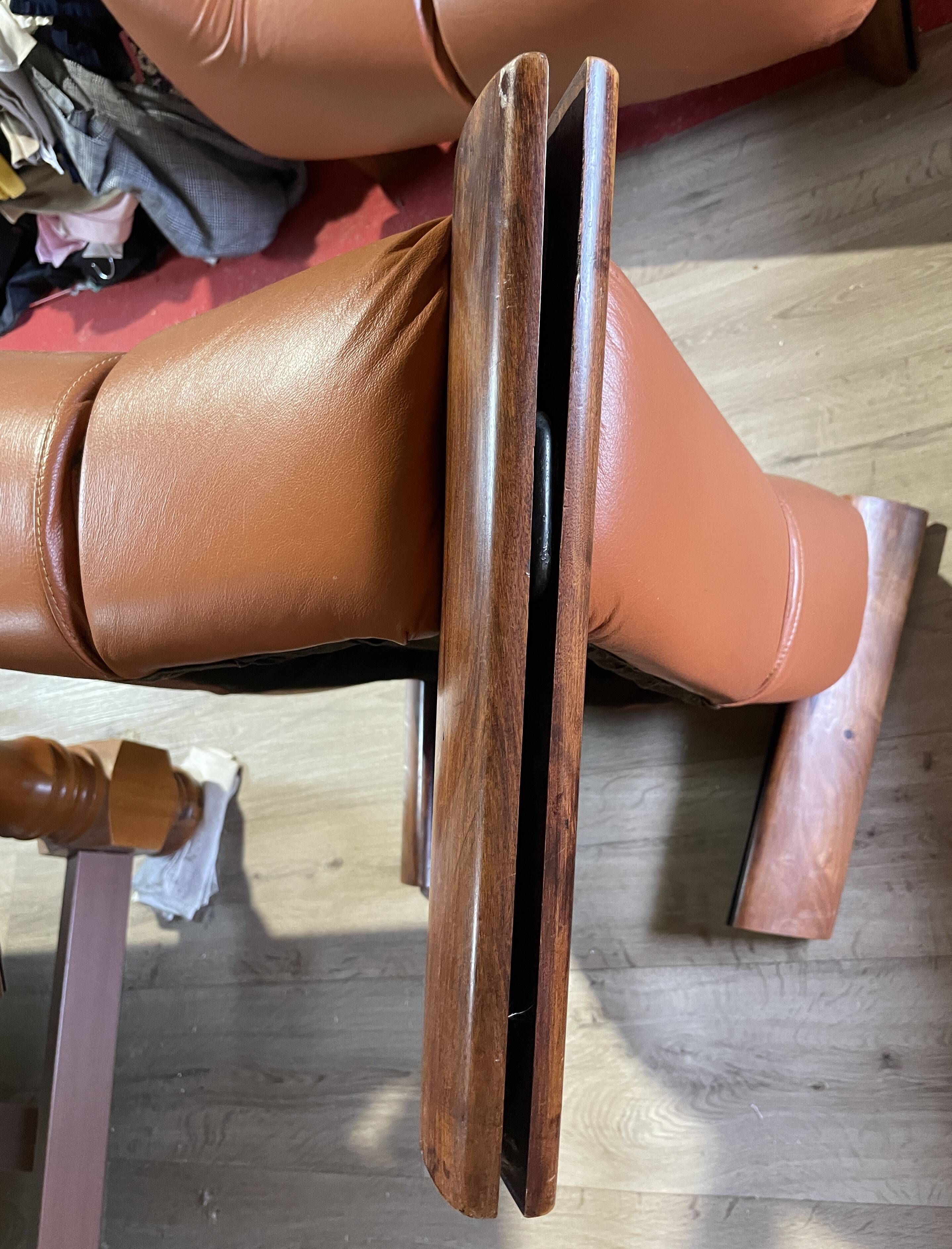 Percival lafer mp-211 sofa set with two armchairs and an ottoman in leather.