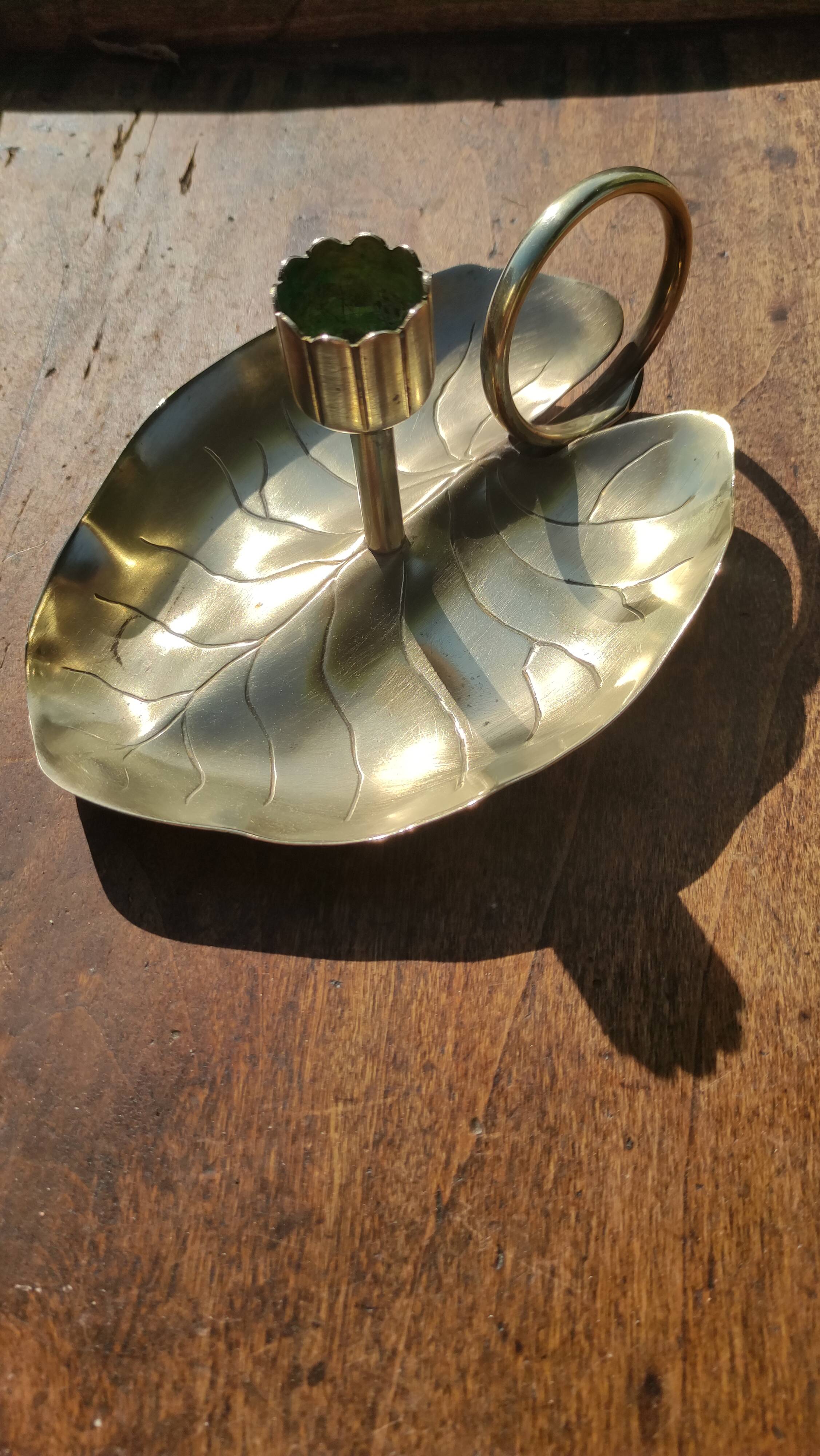 Vintage candle holder in golden brass