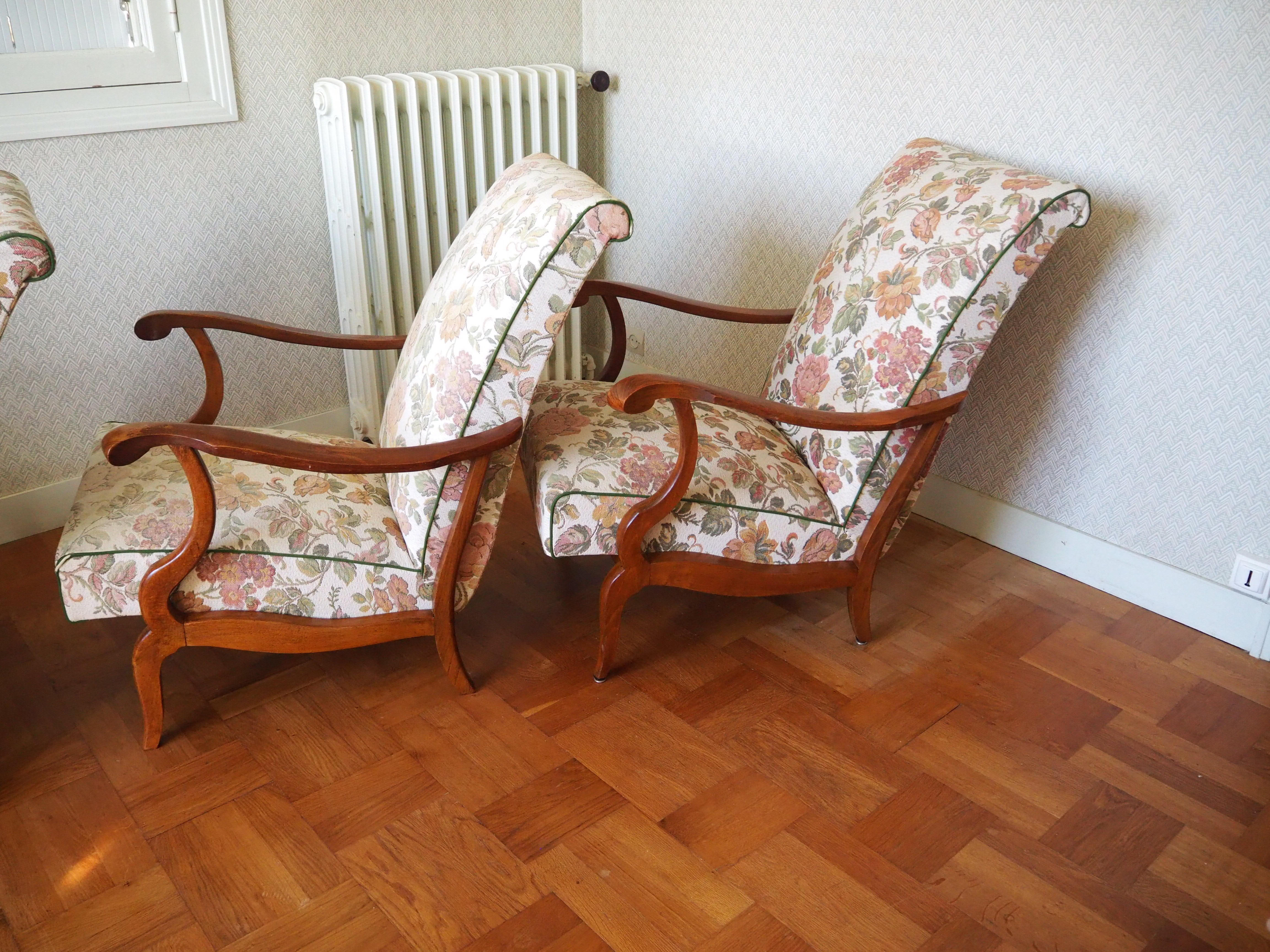 Four 1950s armchairs - wooden armrests