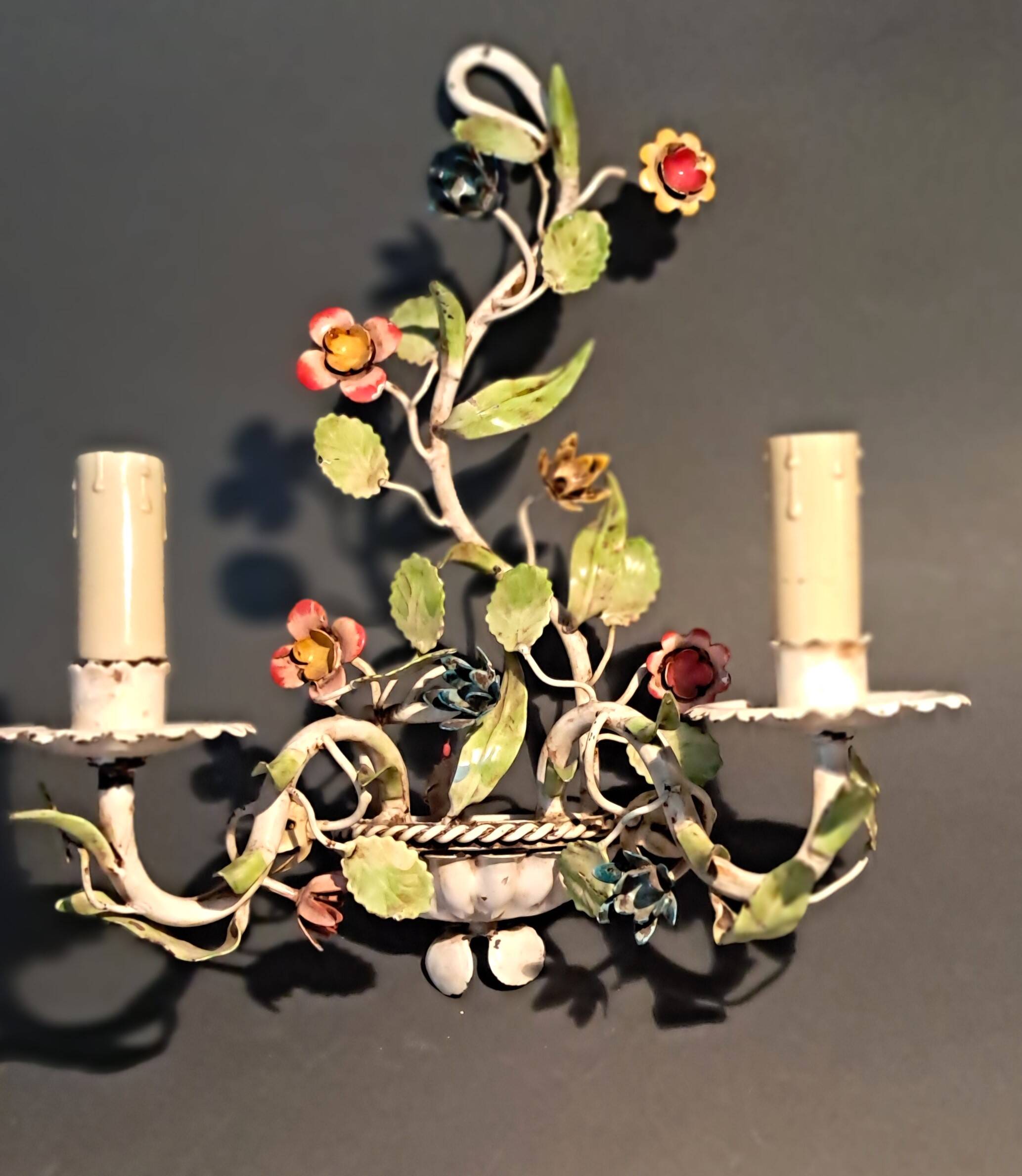 Two-light polychrome painted wrought iron wall lights, Italy 1950/1960.