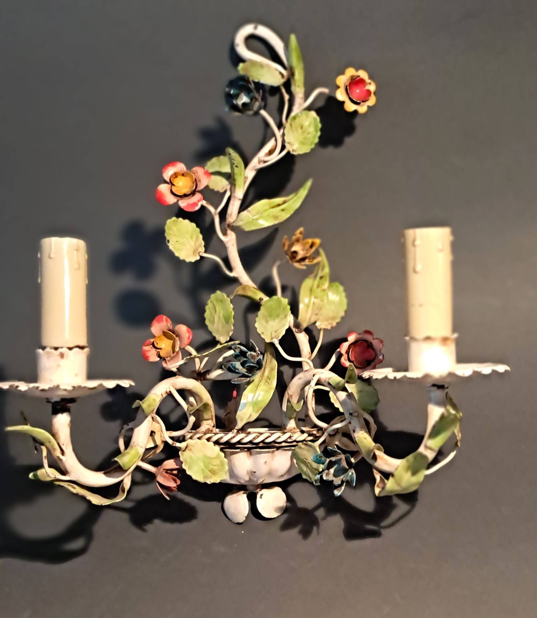Two-light polychrome painted wrought iron wall lights, Italy 1950/1960.