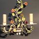 Two-light polychrome painted wrought iron wall lights, Italy 1950/1960.