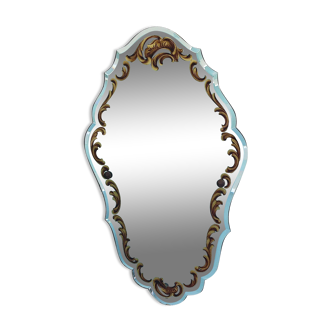 Beveled and églomisé mirror in vintage baroque style