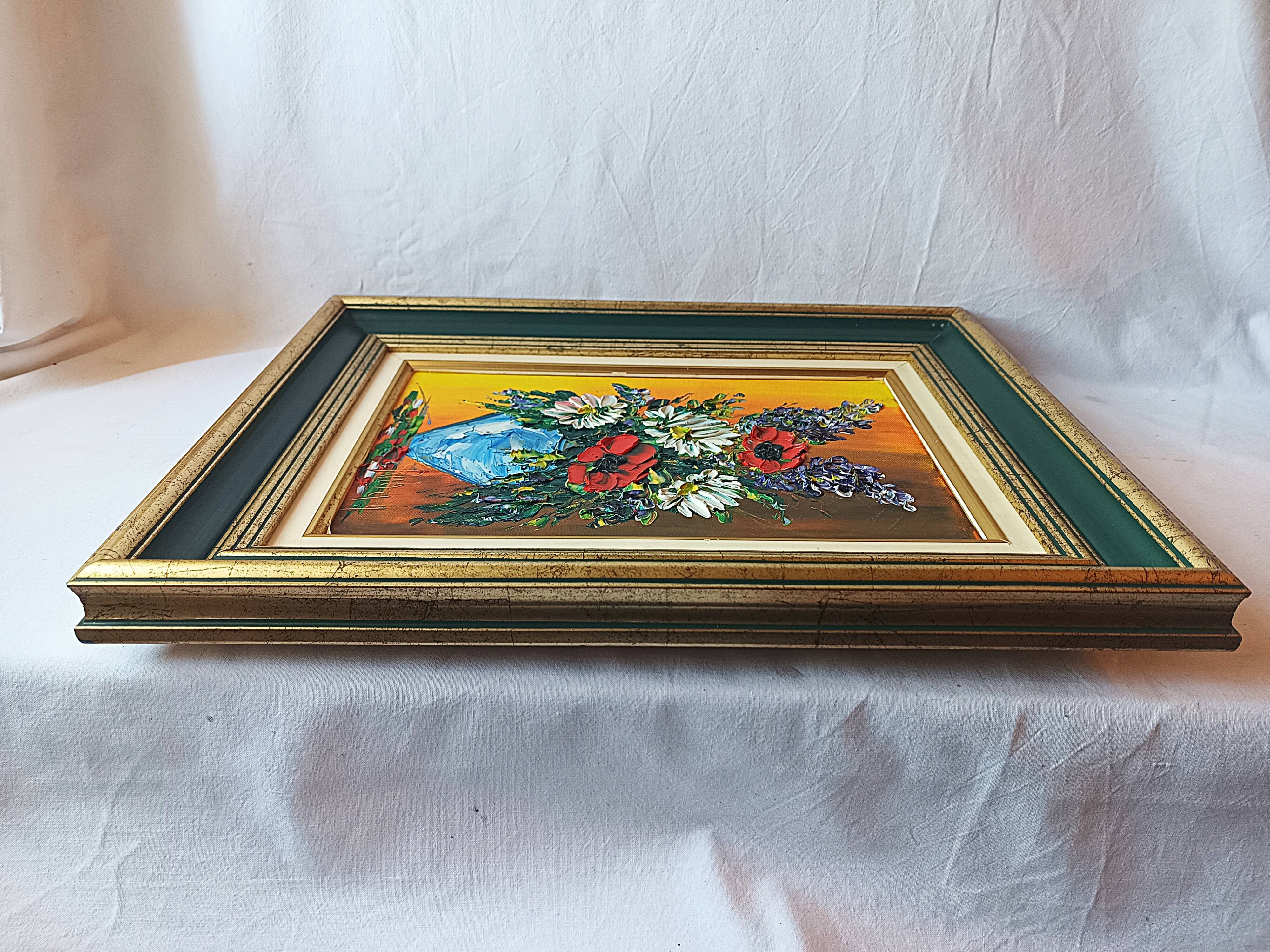 Oil painting on canvas, bouquet of flowers in a framed vase, signed.