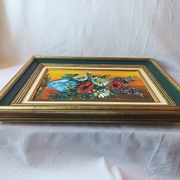 Oil painting on canvas, bouquet of flowers in a framed vase, signed.