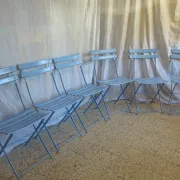 6 blue folding garden chairs