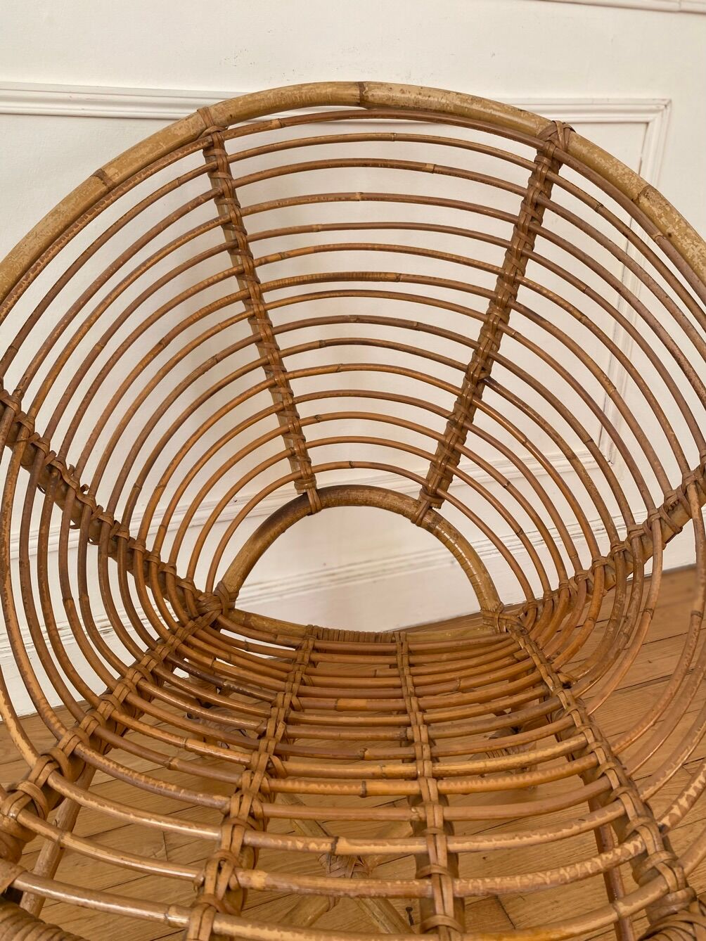 Vintage rattan spiral basket armchair